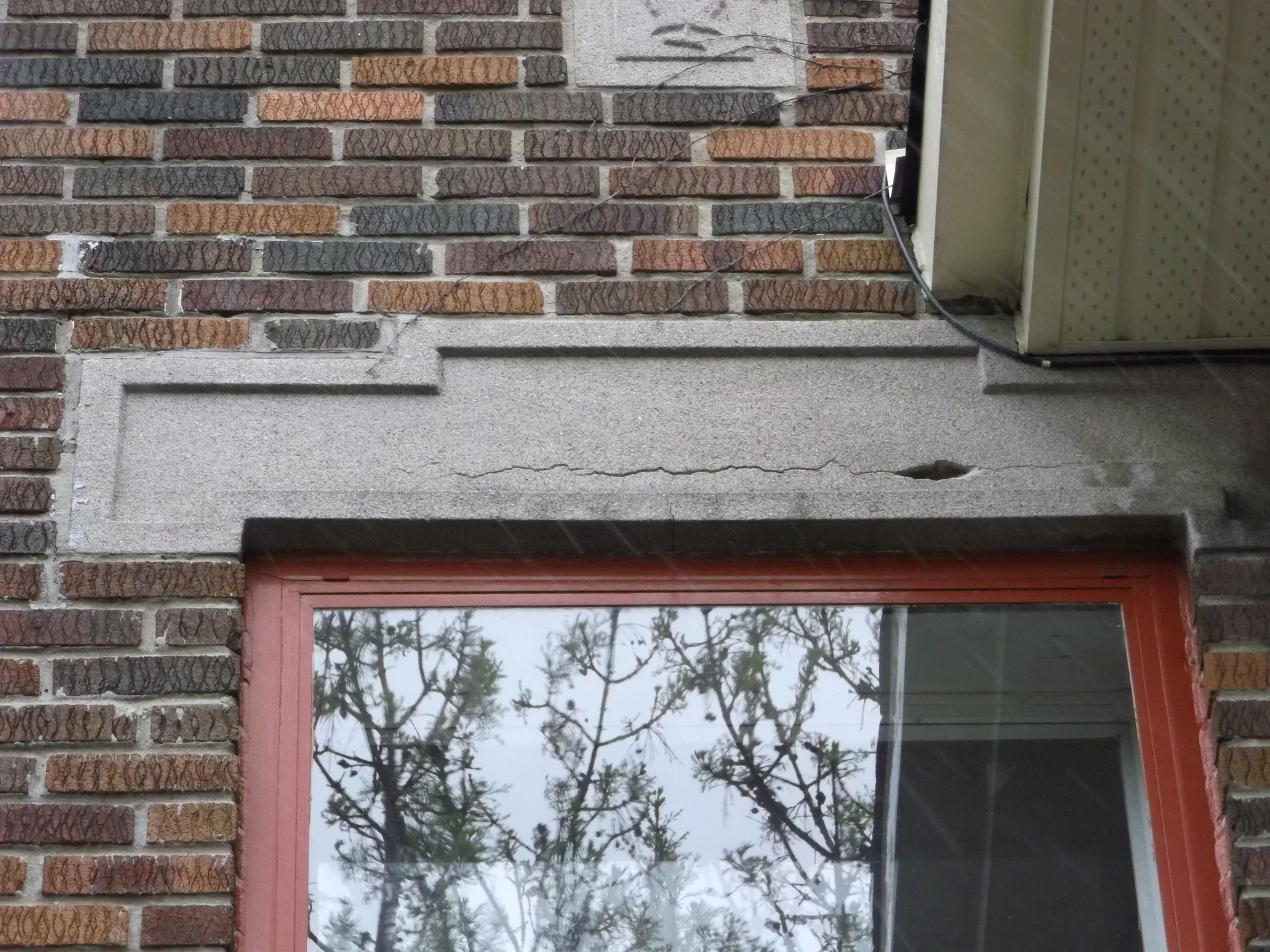 Détail de brique et de pierre posée par A. Blanchette Maçonnerie